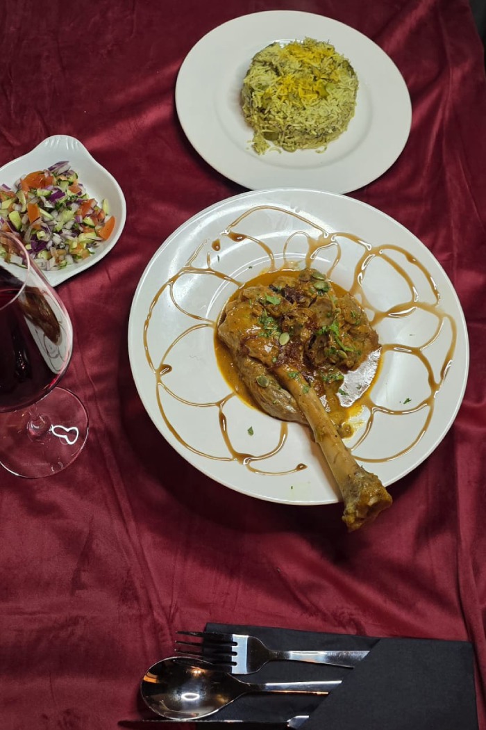 Ziba Restaurant’s tender, slow-cooked lamb shank served on a bed of dill and fava bean rice in 
Dunfermline.